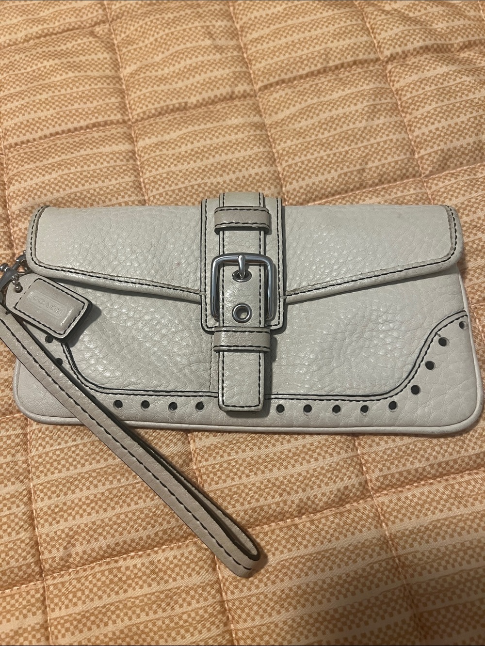 Coach Pebbled Leather Wristlet Clutch in Ivory with Buckle Detail